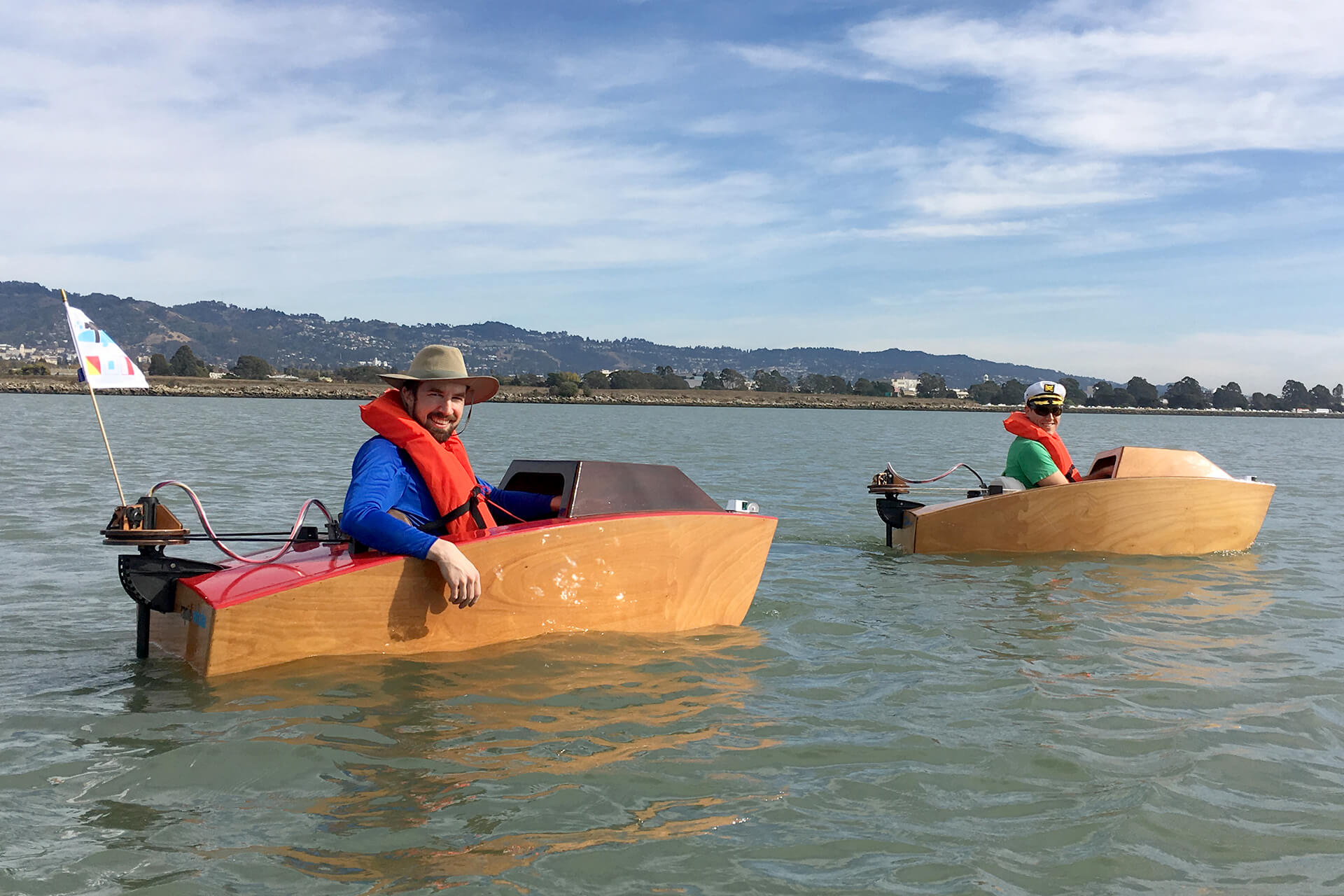 Josh and Dylan in their mini boats in berkeley