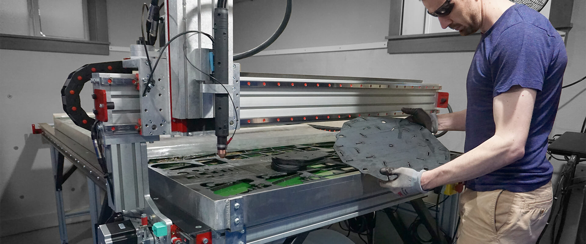 The owner tending to a cnc plasma cutter.